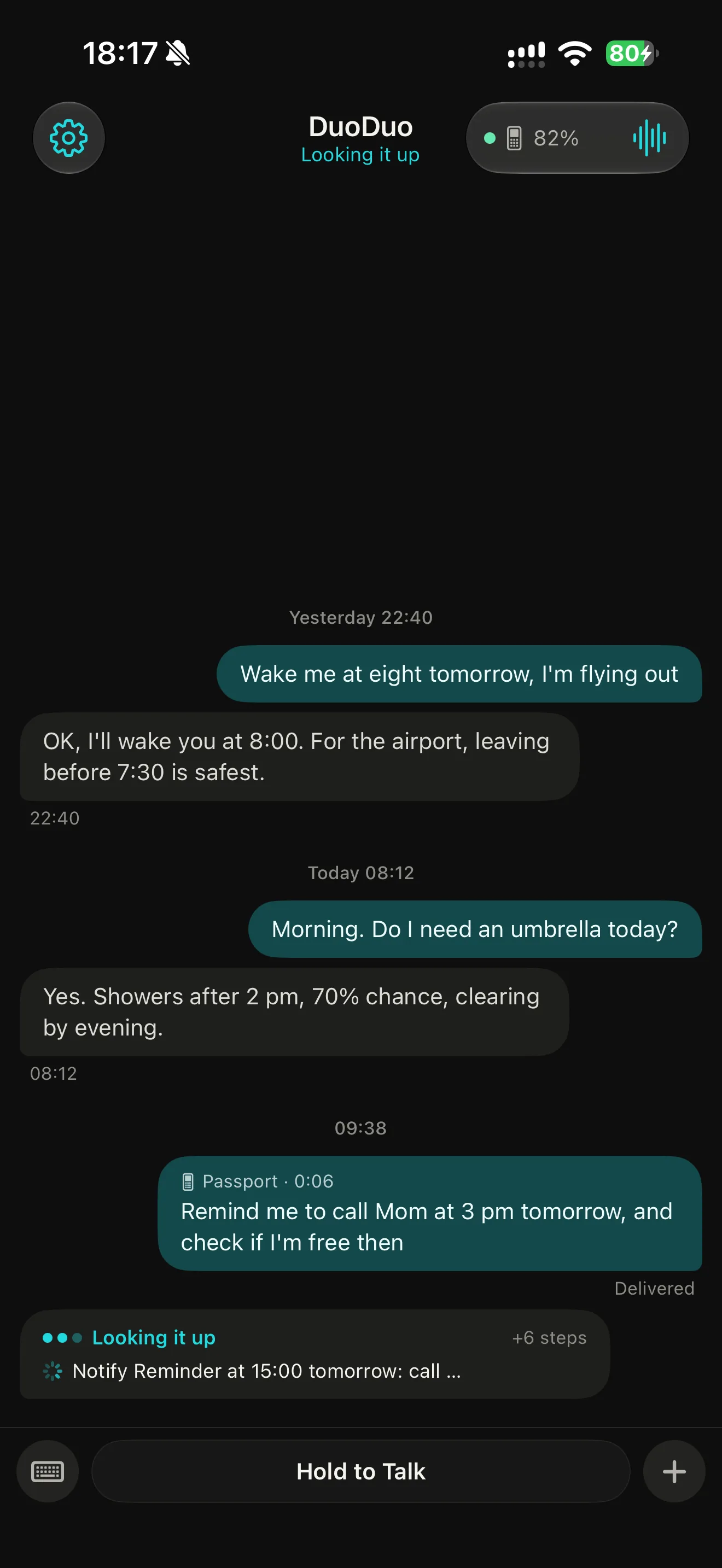 The DuoDuo iPhone app showing a conversation while DuoDuo works on a request